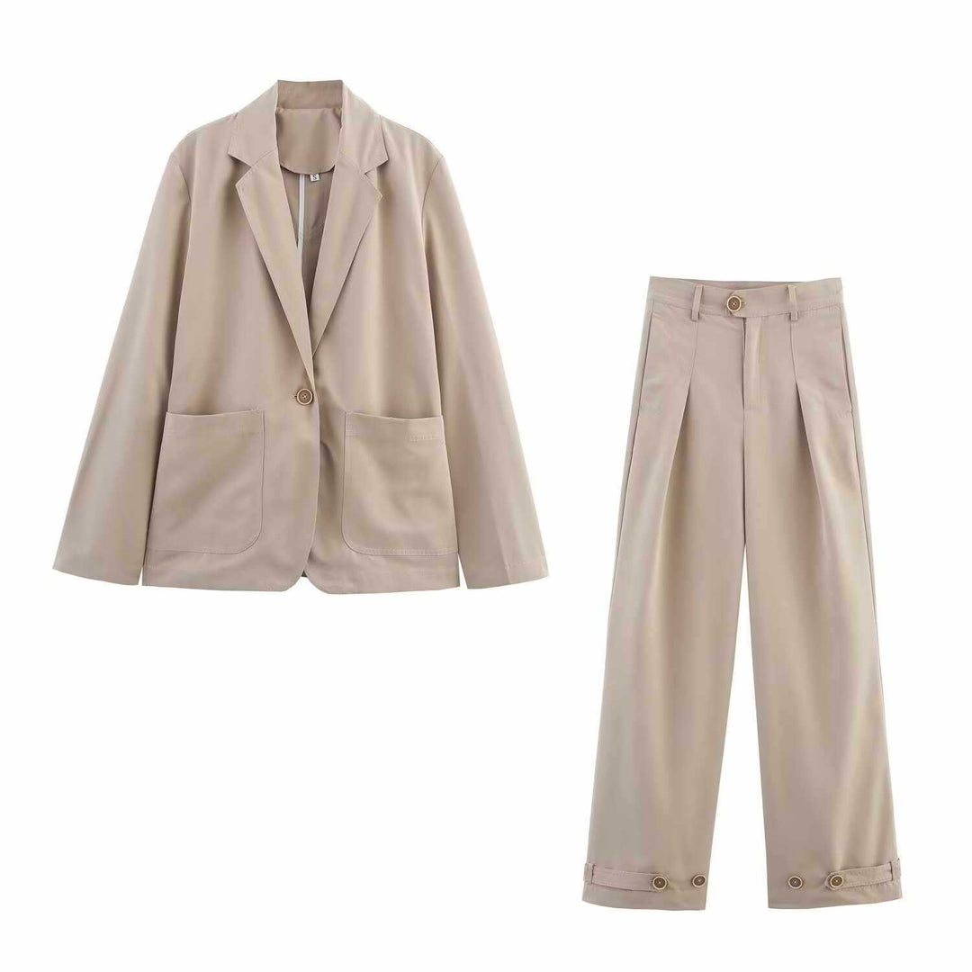 Damer vid hög midja vida byxor i tyg med eleganta knapppdetaljer Eva Jonsson-Eva Jonsson