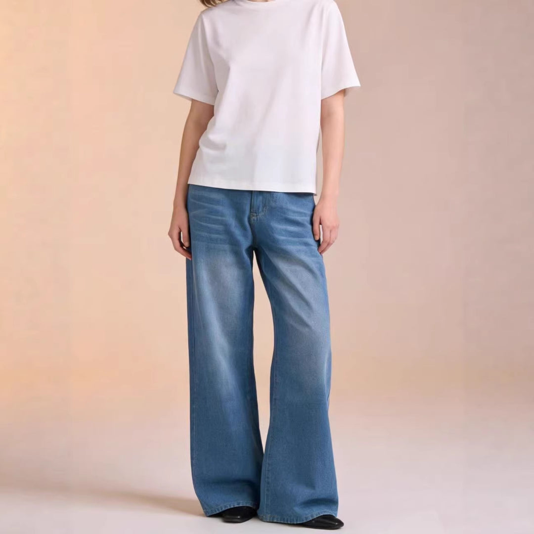 Damer vid jeans med vintage-wash och hög skuren midja Mirla-Eva Jonsson