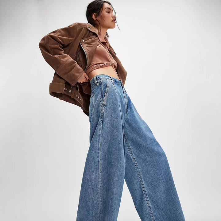 Damer vida denimbyxor med hög midja och avslappnad silhuett Mirla-Eva Jonsson