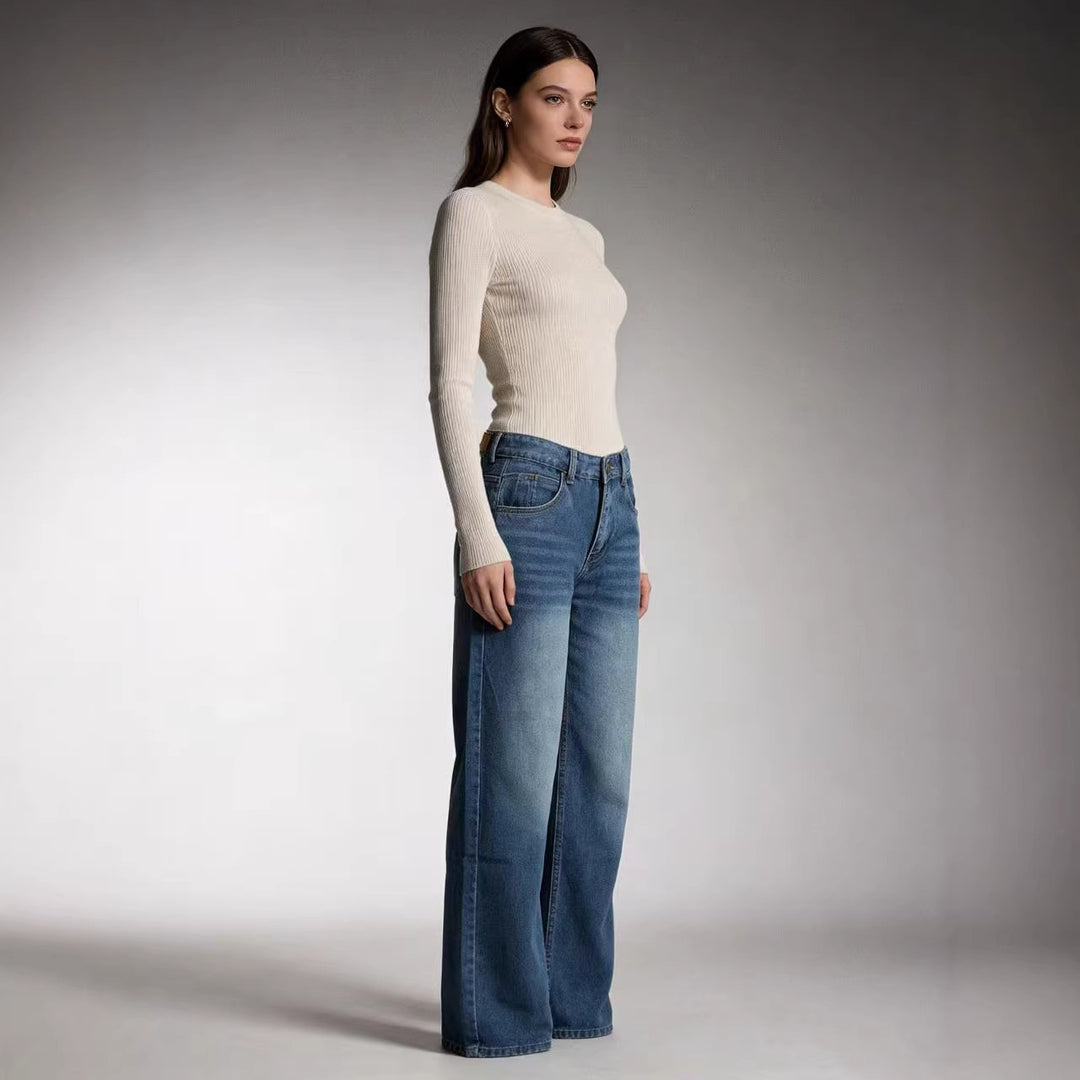 Damer vida denimbyxor med högmidja och avslappnad passform Mirla-Eva Jonsson