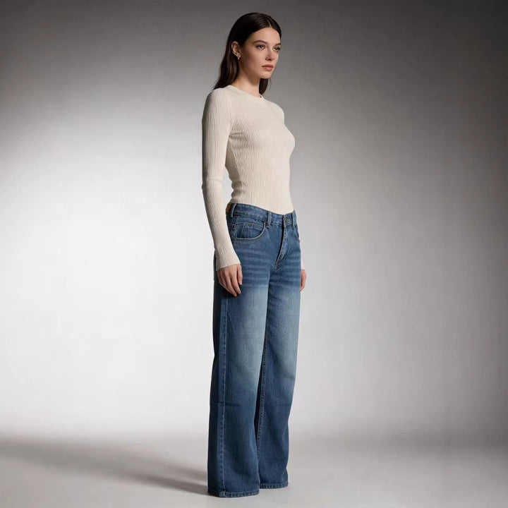 Damer vida denimbyxor med högmidja och avslappnad passform Mirla-Eva Jonsson