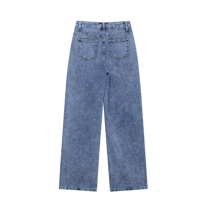 Damer vida denimbyxor med patchdesign Mirla-Eva Jonsson
