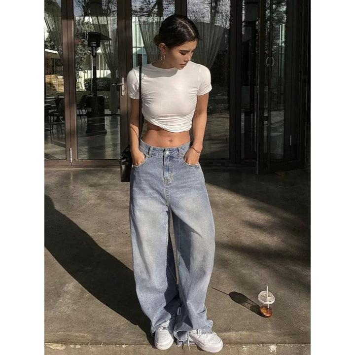 Damer vida högmidjade jeans med dekorativa fickor Mirla-Eva Jonsson