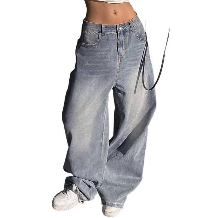 Damer vida högmidjade jeans med dekorativa fickor Mirla-Eva Jonsson