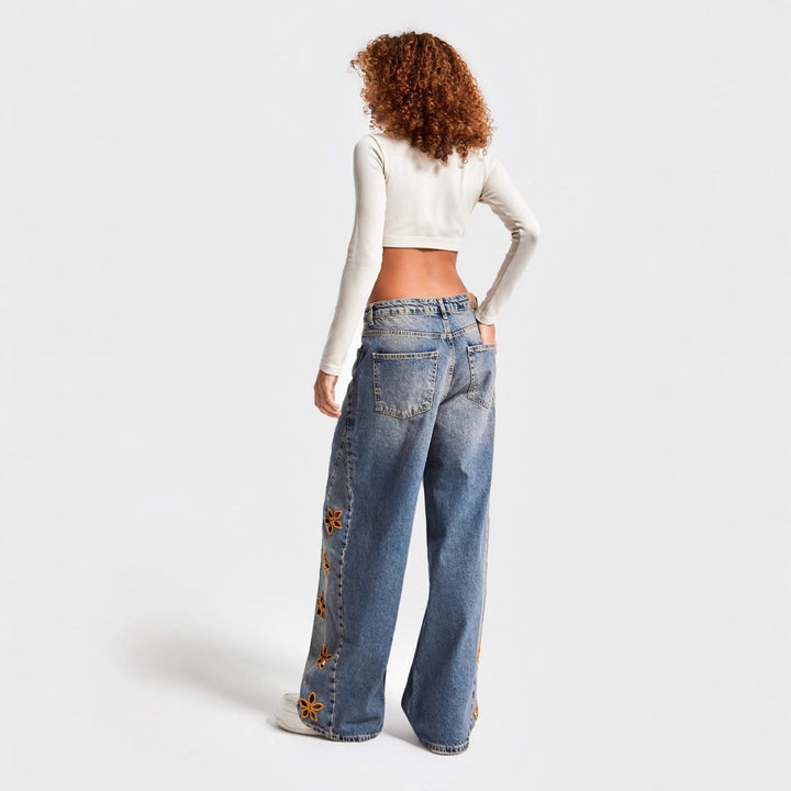 Damer vida jeans med blommönster broderi Mirla-Eva Jonsson