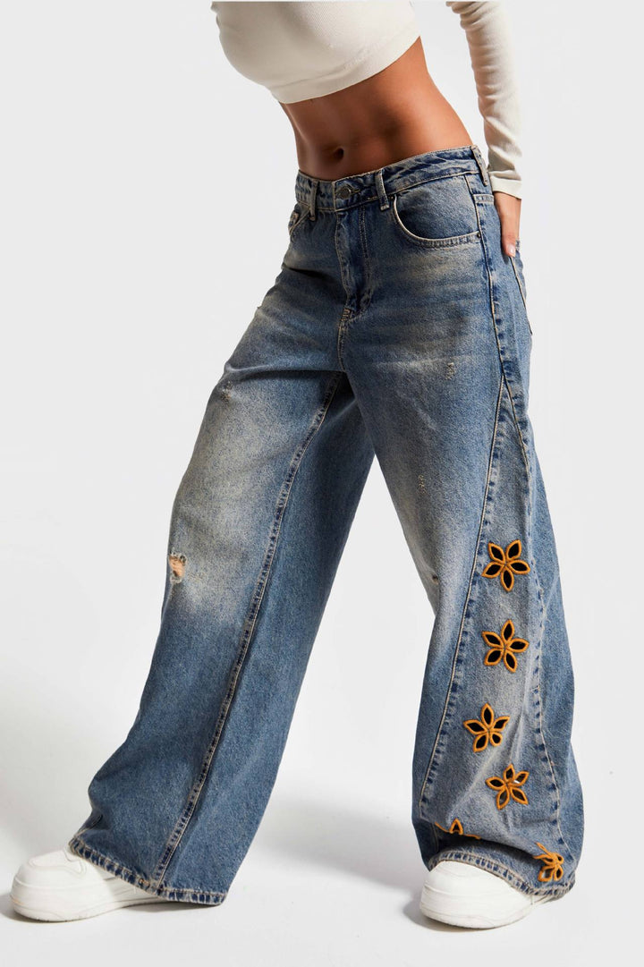 Damer vida jeans med blommönster broderi Mirla-Eva Jonsson