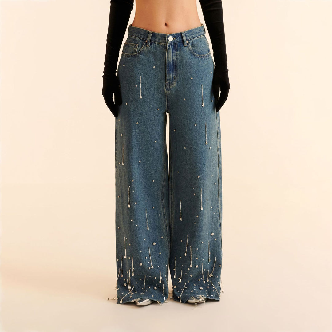 Damer vida jeans med dekorativa pärl-applikationer Mirla-Eva Jonsson
