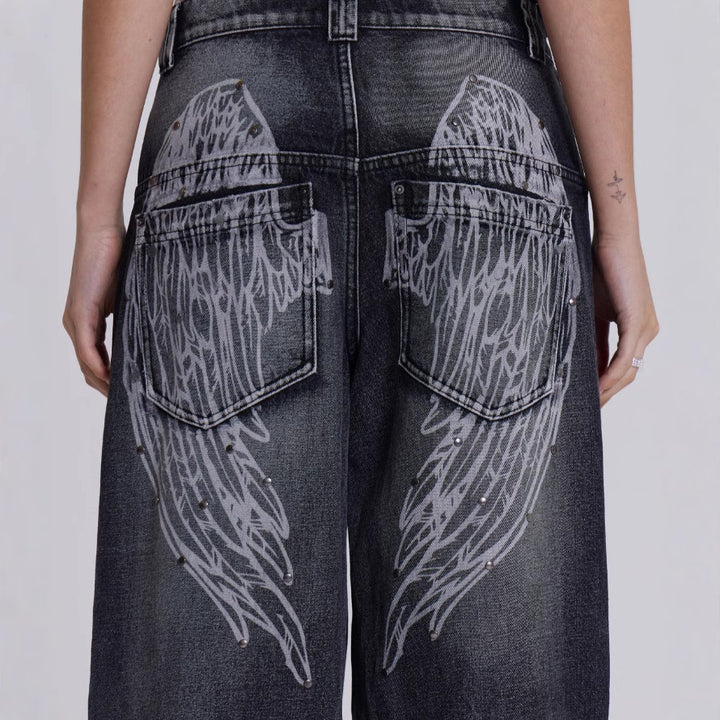 Damer vida jeans med konstnärlig vingdesign och unika detaljer Mirla-Eva Jonsson
