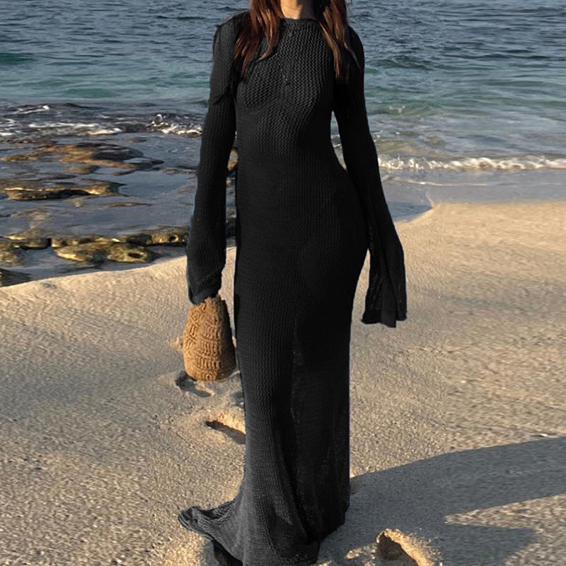 Damer virkad strandmaxiklänning med vid passform och eleganta klockärmar Mirla-Eva Jonsson