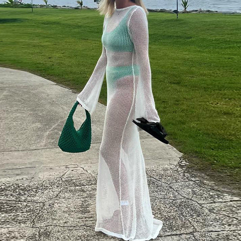 Damer virkad strandmaxiklänning med vid passform och eleganta klockärmar Mirla-Eva Jonsson