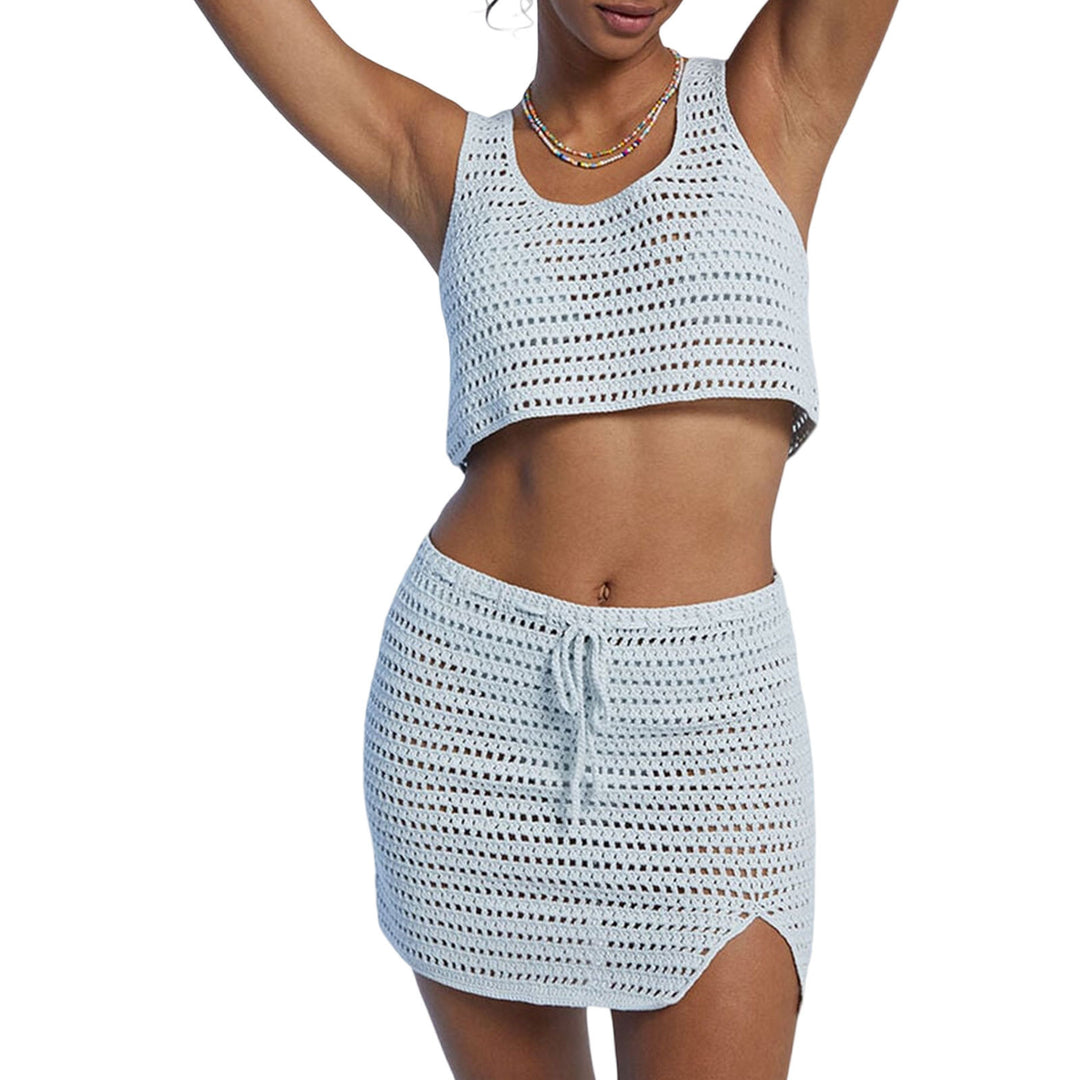 Damer virkad strandset med crop-top och minikjol Mirla-Eva Jonsson