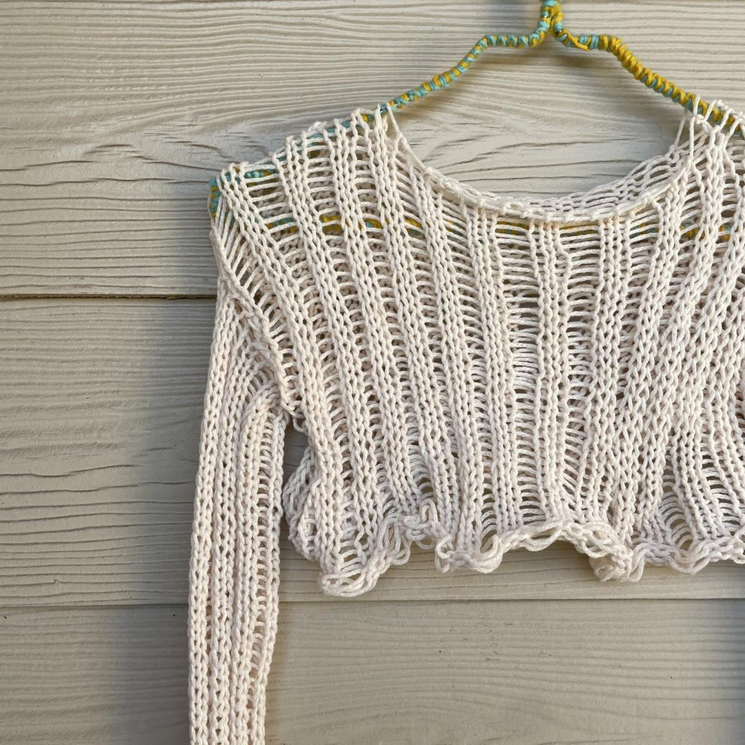 Damer virkade crop-top med öppna ärmar och avslappnad design Mirla-Eva Jonsson