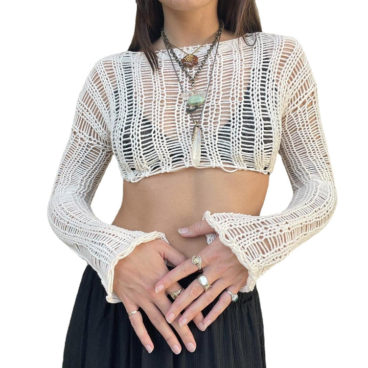 Damer virkade crop-top med öppna ärmar och avslappnad design Mirla-Eva Jonsson