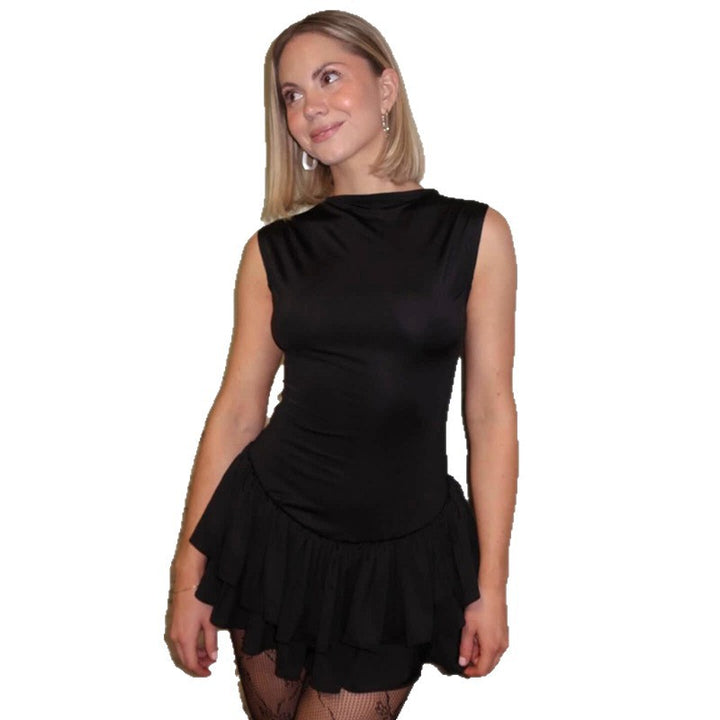 Damer volang mini-klänning med figurnära överdel och flödande tyg Mirla-Eva Jonsson
