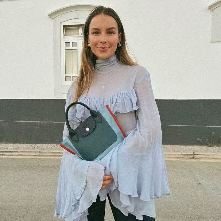 Damer volangblus med bred vingenärm och elegant halsbindning Mirla-Eva Jonsson