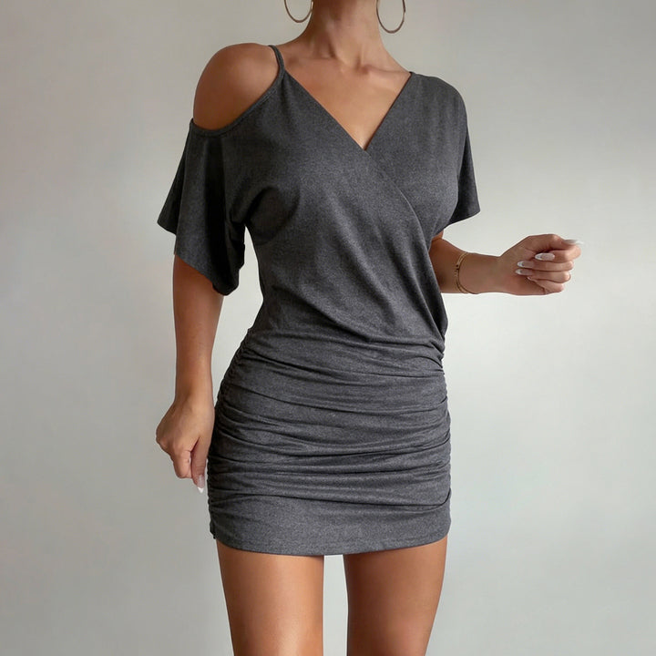 Damer wrap-top med asymmetrisk skärning och avslappnad design Mirla-Eva Jonsson
