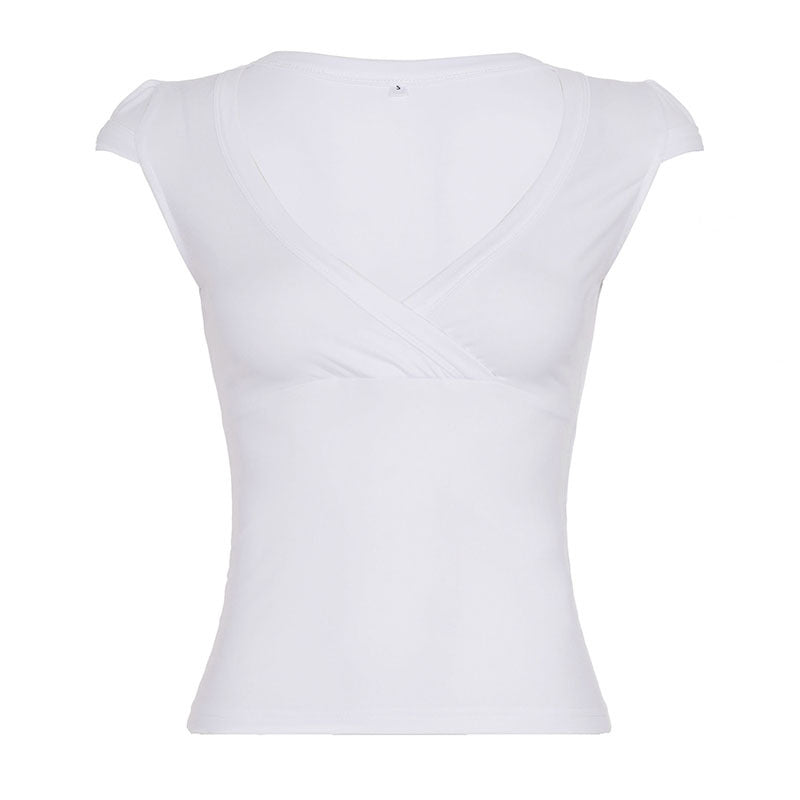 Damer wrap-top med djup V-hals och elastiska puffärmar Mirla-Eva Jonsson