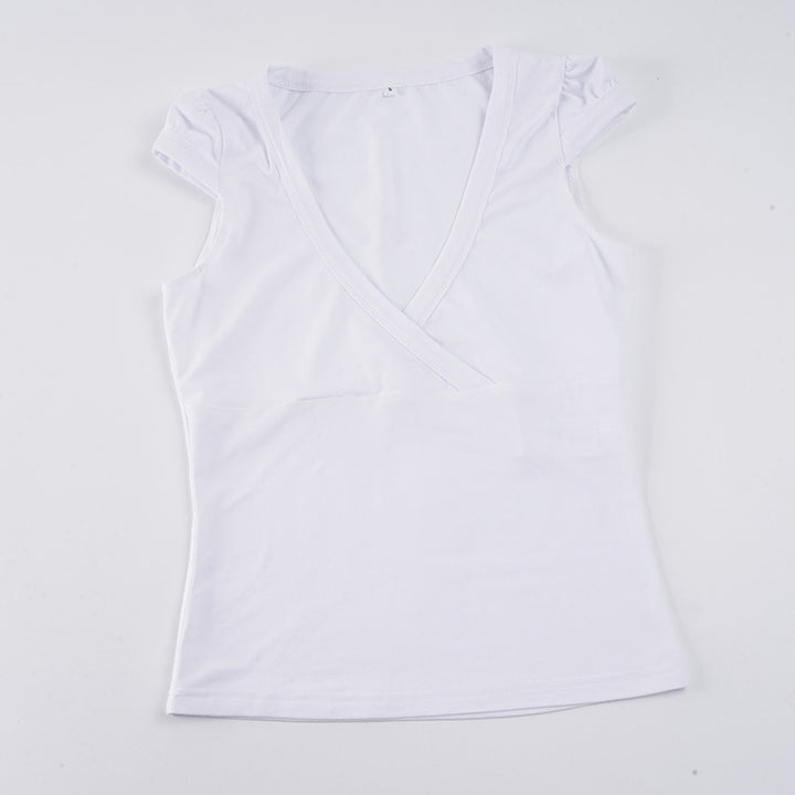 Damer wrap-top med djup V-hals och elastiska puffärmar Mirla-Eva Jonsson