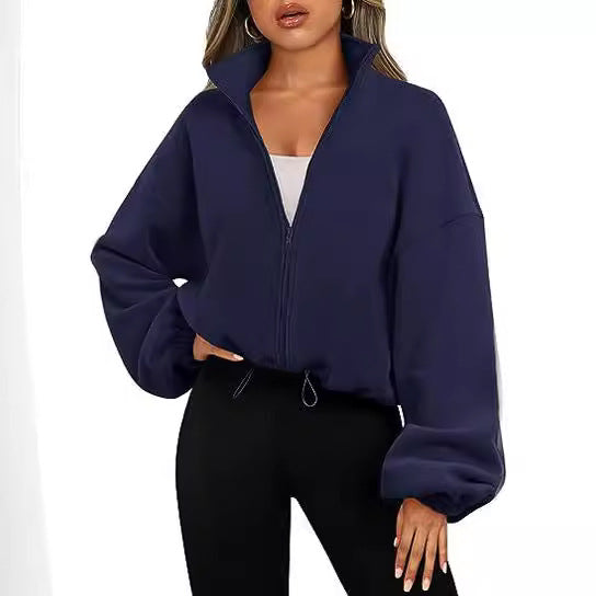 Damer zip-hoodie med hög krage och kontrasterande ärmar Mirla-Eva Jonsson