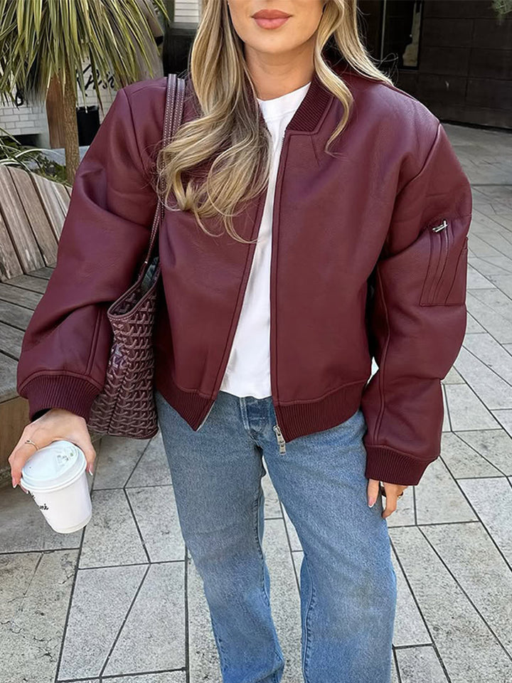 Damern Avslappnad Läderjacka med voluminösa ärmar och dragkedja Eva Jonsson-Eva Jonsson