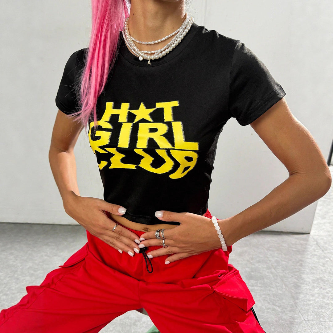 Damern Crop-T-Shirt med iögonfallande text och figurnära skärning Mirla-Eva Jonsson