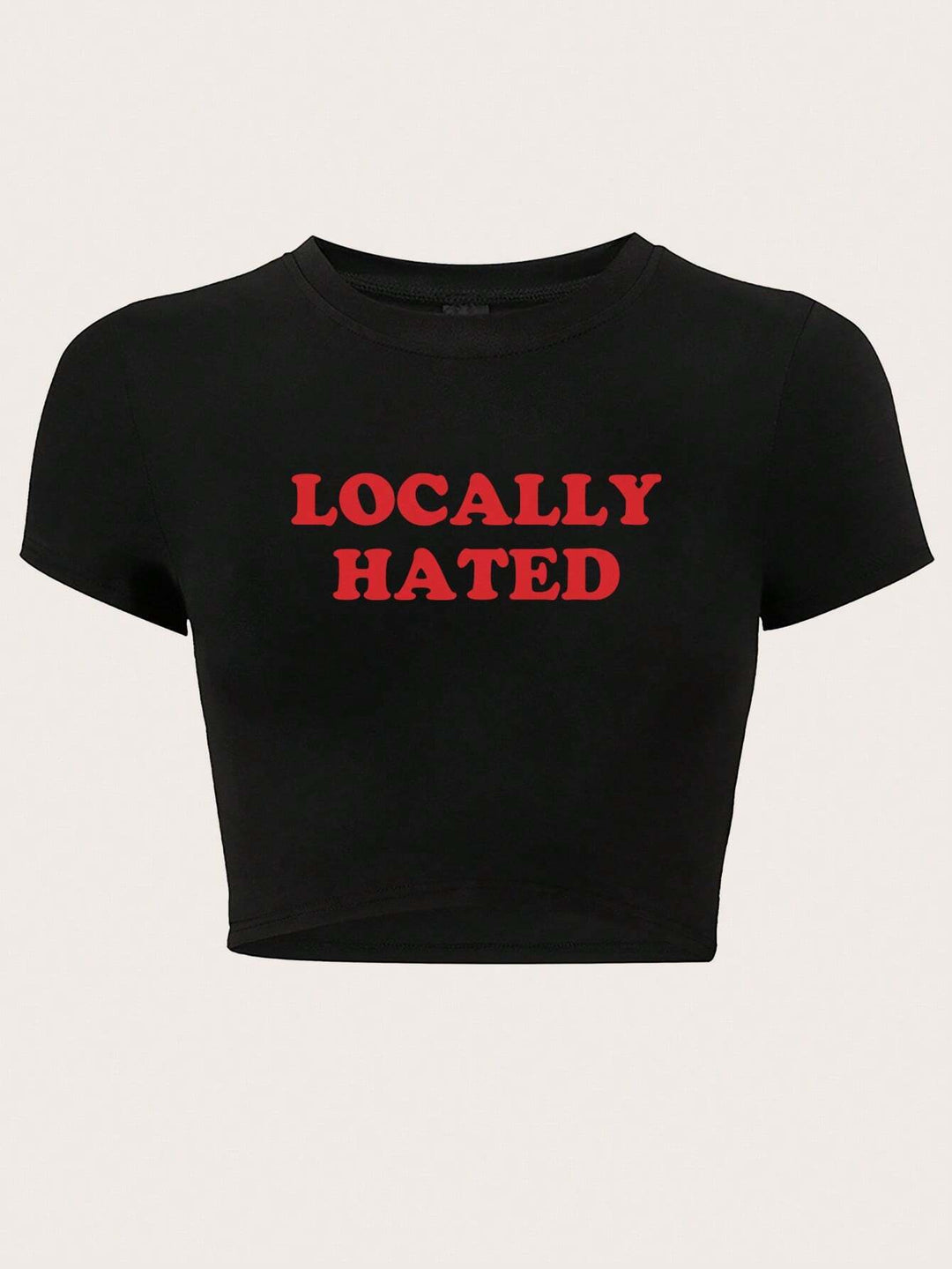 Damern Crop-T-shirt med iögonfallande text och figurnära design Mirla-Eva Jonsson