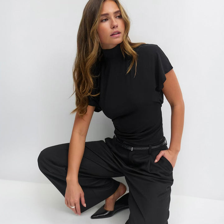 Damern Cropped Topp med hög krage och volumiösa ärmar Mirla-Eva Jonsson
