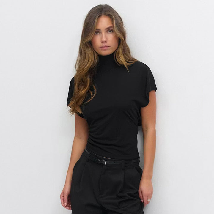 Damern Cropped Topp med hög krage och volumiösa ärmar Mirla-Eva Jonsson