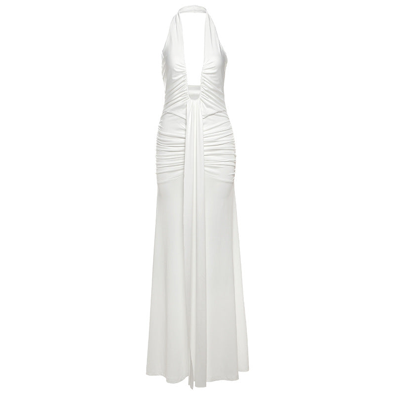 Damern Elegant Maxi-klänning med djup V-ringning och volangdetaljer Mirla-Eva Jonsson