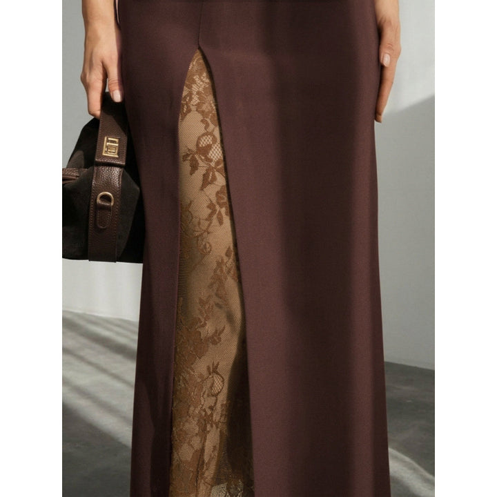 Damern Elegant Maxikjol med transparenta spetsinsatser och sidodelningsspricka Mirla-Eva Jonsson