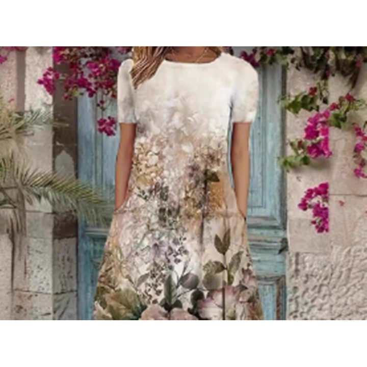 Damern Elegant Maxiklänning med blommönster och ömt rundhalsutskärning Mirla-Eva Jonsson