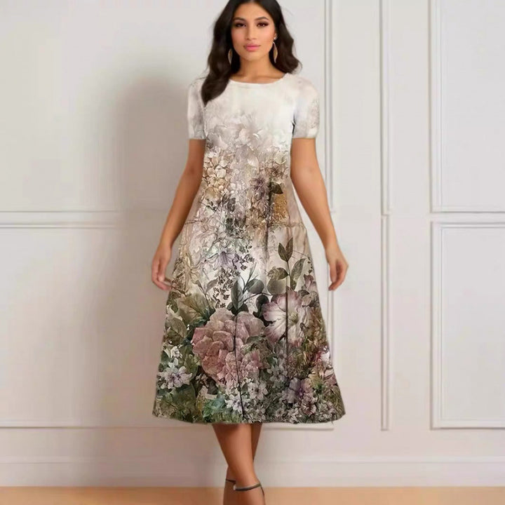 Damern Elegant Maxiklänning med blommönster och ömt rundhalsutskärning Mirla-Eva Jonsson