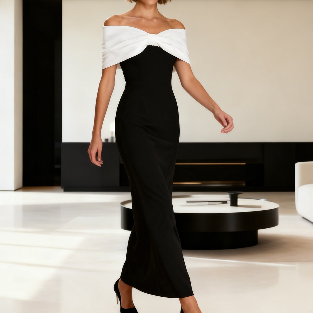 Damern Elegant Maxiklänning med off-shoulder design och figursydd skärning Mirla-Eva Jonsson