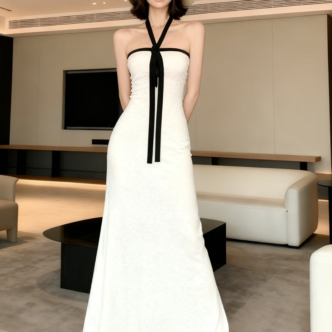 Damern Elegant Maxiklänning med off-shoulder design och figursydd skärning Mirla-Eva Jonsson