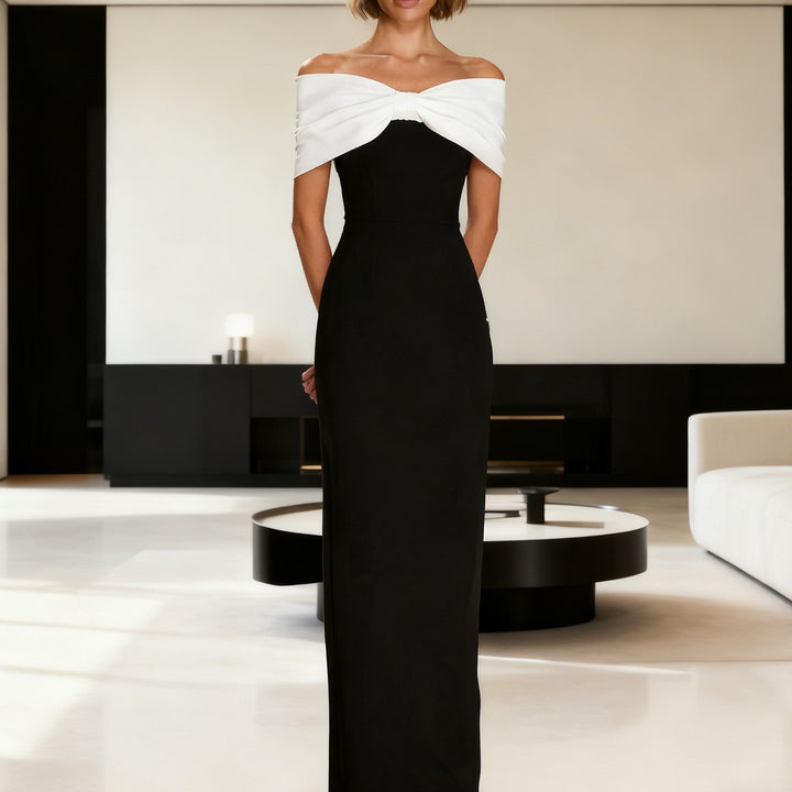 Damern Elegant Maxiklänning med off-shoulder design och figursydd skärning Mirla-Eva Jonsson