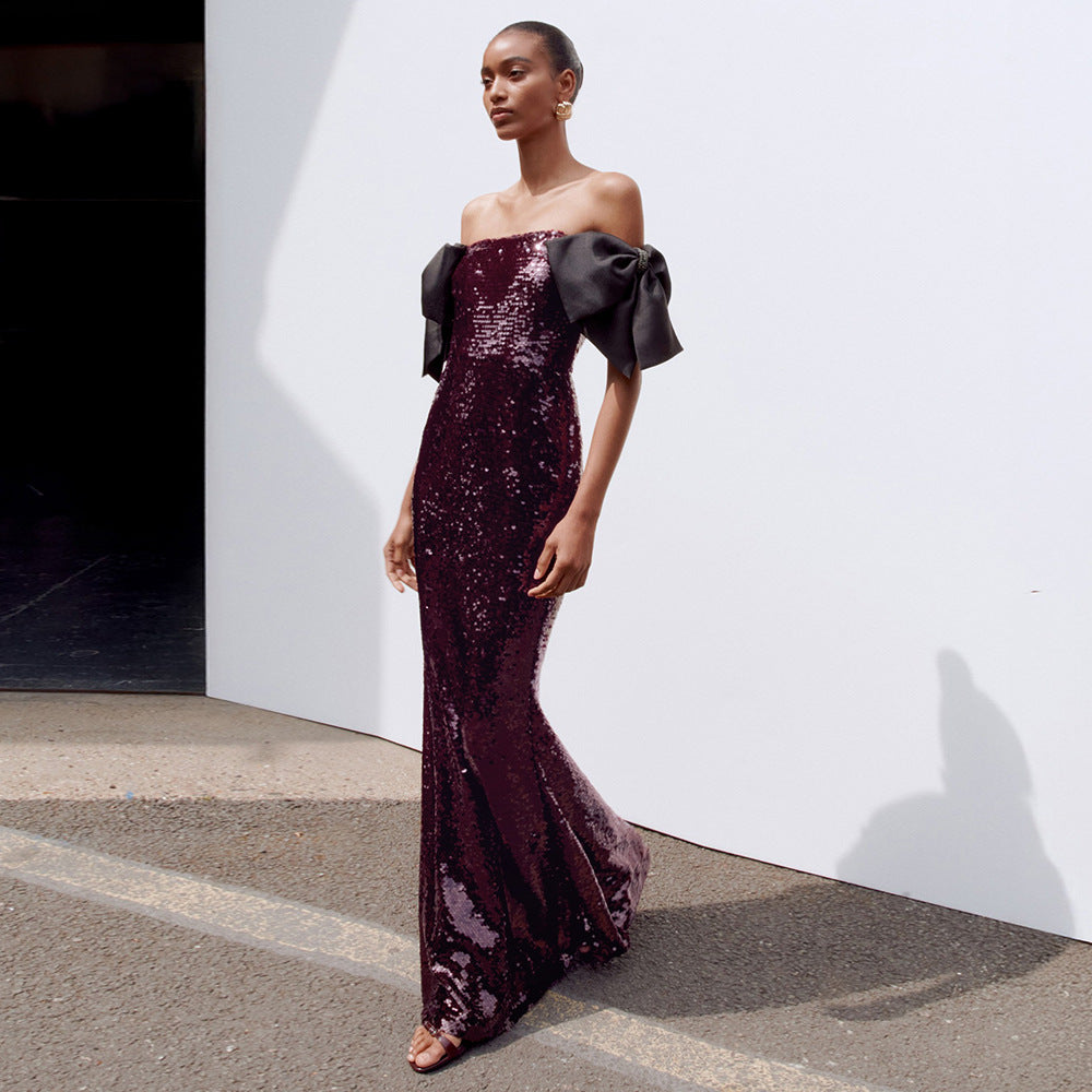 Damern Elegant Paljett Maxi Klänning med off-shoulder Design och dekorativa Slips Mirla-Eva Jonsson