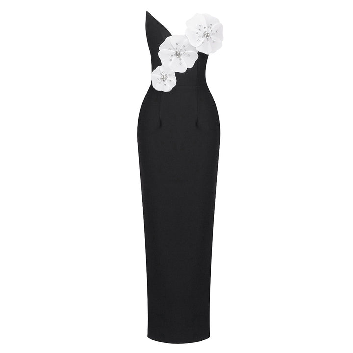 Damern Elegant golvlång klänning med asymmetrisk utförande och blommönster Mirla-Eva Jonsson