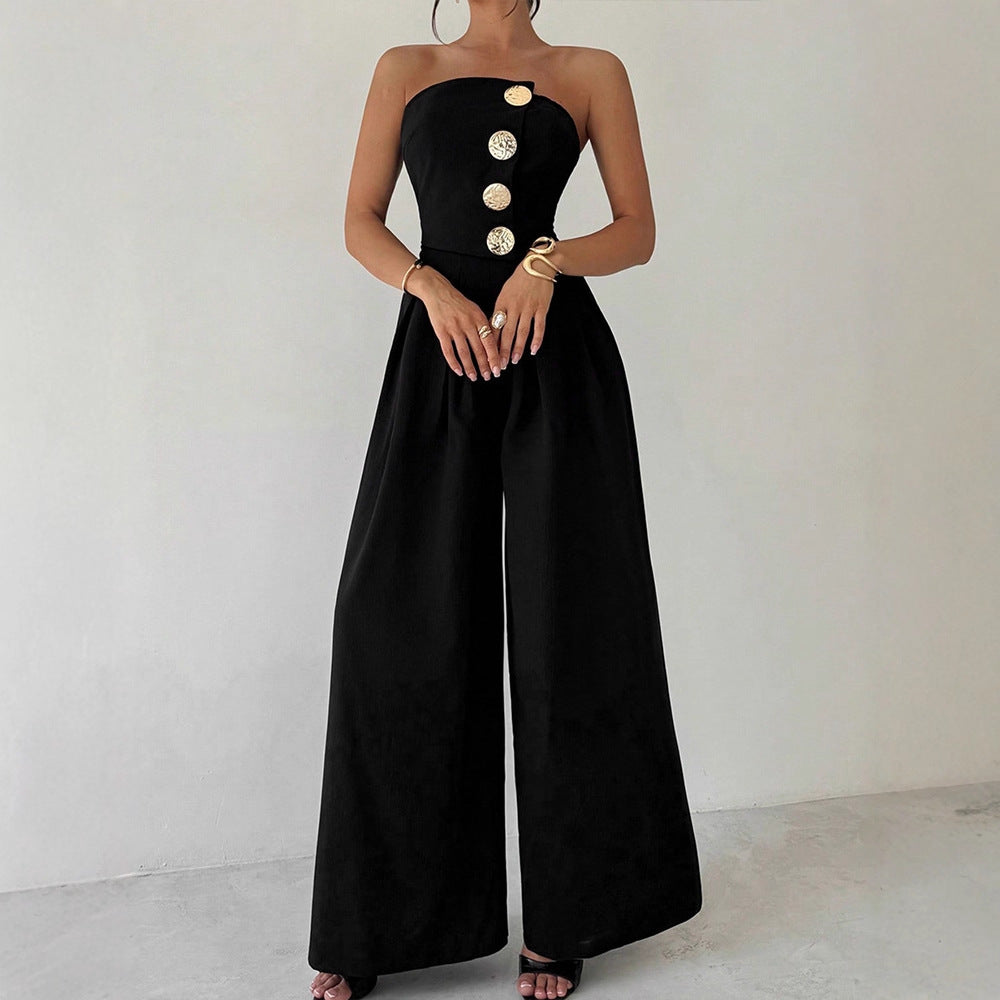 Damern Elegant jumpsuit med asymmetrisk utskärning och dekorativa knappar Mirla-Eva Jonsson