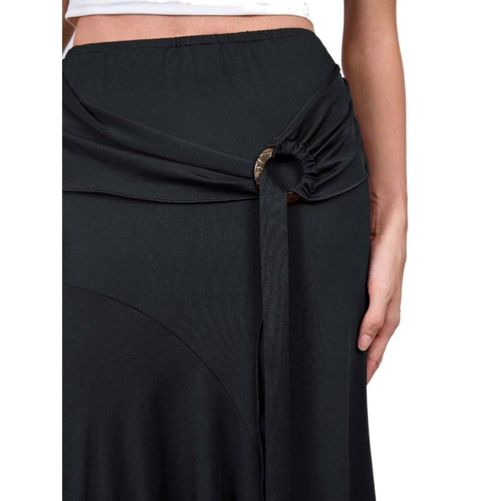 Damern Elegant maxikjol med asymmetrisk snitt och praktiskt midjeband Mirla-Eva Jonsson