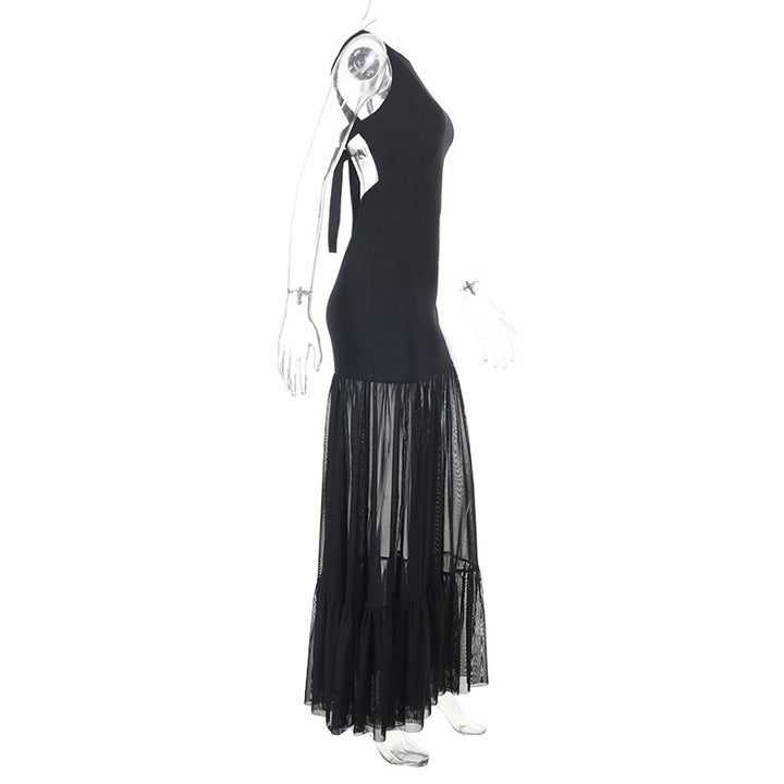 Damern Elegant maxiklänning med transparenta insatser och volangdetaljer Mirla-Eva Jonsson
