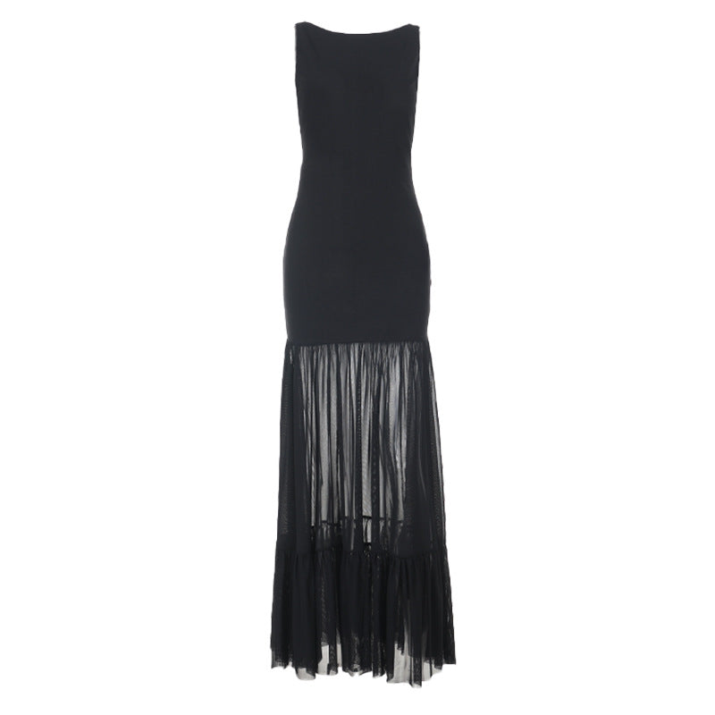 Damern Elegant maxiklänning med transparenta insatser och volangdetaljer Mirla-Eva Jonsson