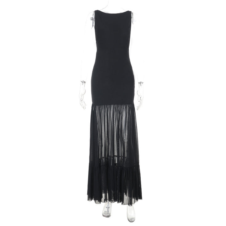 Damern Elegant maxiklänning med transparenta insatser och volangdetaljer Mirla-Eva Jonsson