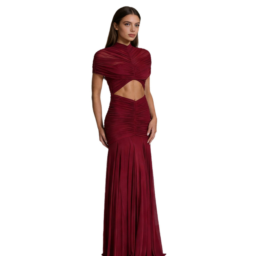 Damern Figurerat Aftonklänning med raffinerad Cut-Out-design och draperad överdel Mirla-Eva Jonsson