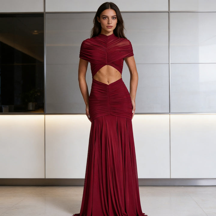 Damern Figurerat Aftonklänning med raffinerad Cut-Out-design och draperad överdel Mirla-Eva Jonsson