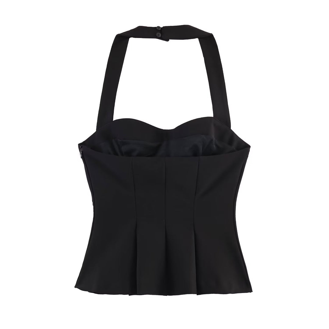 Damern Haltertop med elegant midjesnitt och fina plisseringsdetaljer Mirla-Eva Jonsson