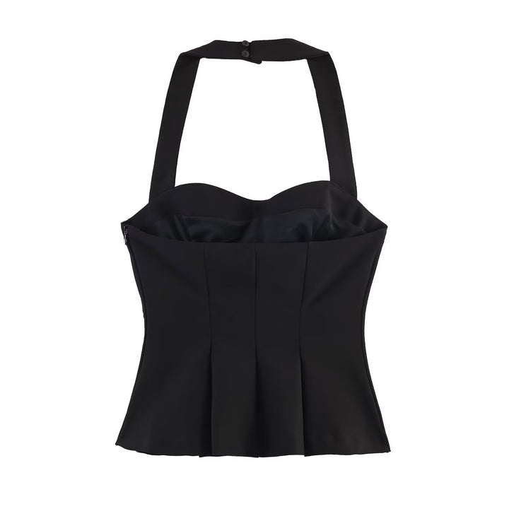 Damern Haltertop med elegant midjesnitt och fina plisseringsdetaljer Mirla-Eva Jonsson