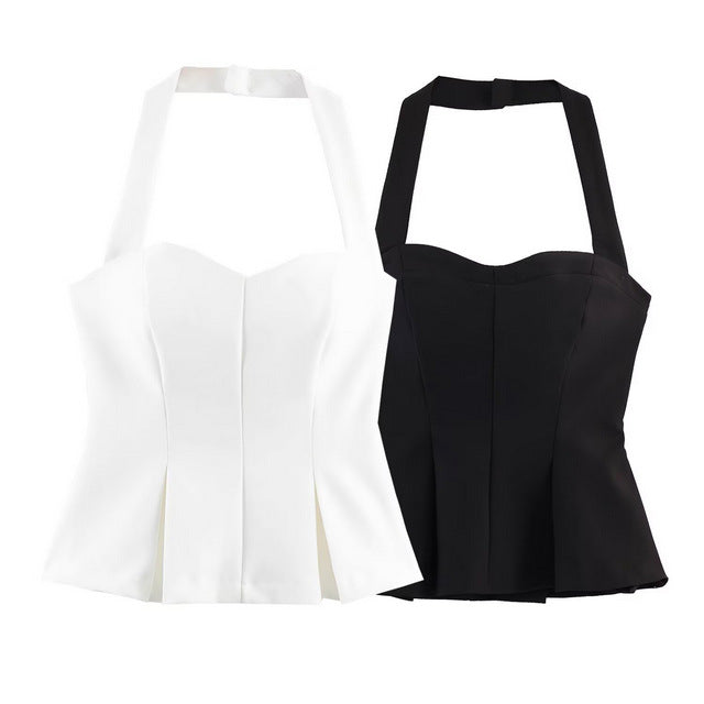 Damern Haltertop med elegant midjesnitt och fina plisseringsdetaljer Mirla-Eva Jonsson