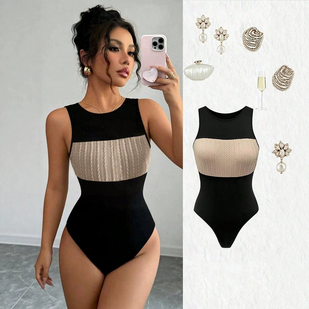 Damern Högskuren baddräkt med elegant, ribbad överdel Mirla-Eva Jonsson