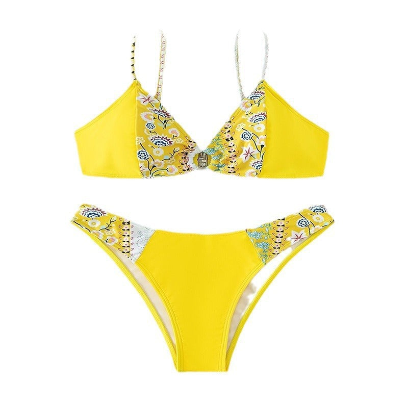 Damern Högskuren triangel-bikini med blommiga applikationer och knappdetalj Mirla-Eva Jonsson