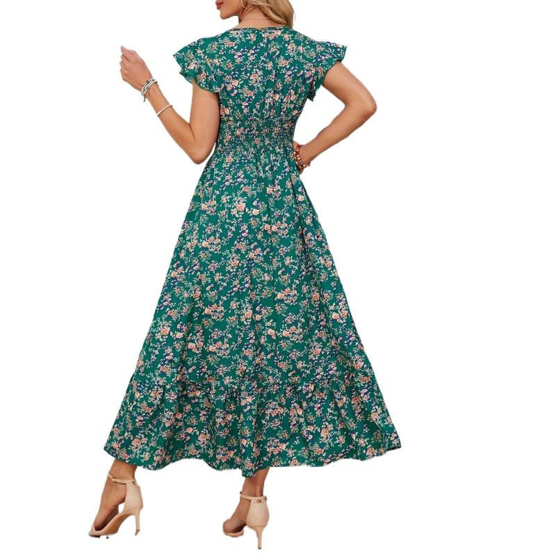 Damern Maxi-klänning med blommigt mönster och voluminösa ärmar Mirla-Eva Jonsson